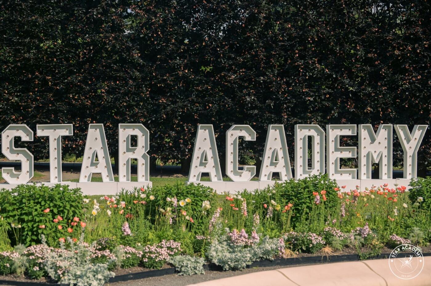 Star Academy sign at the commencement venue