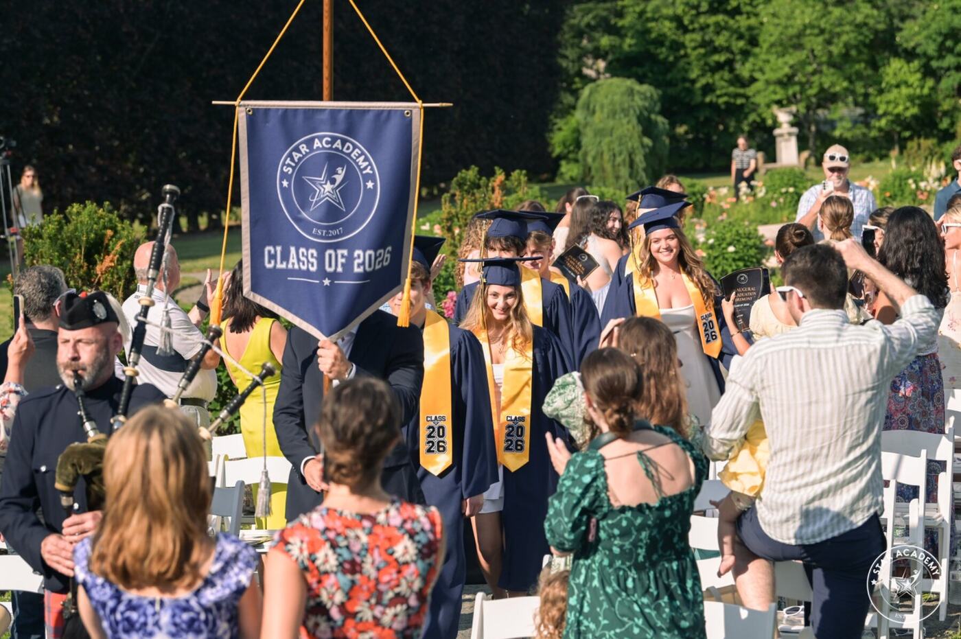 Graduates entering the commencement ceremony