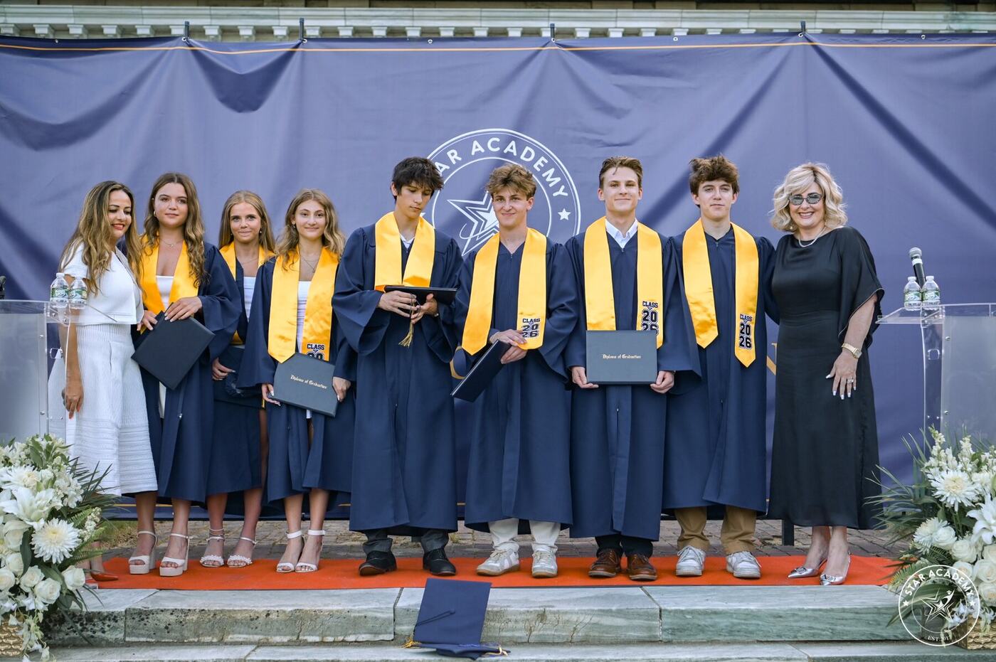 Class of 2026 holding their diplomas
