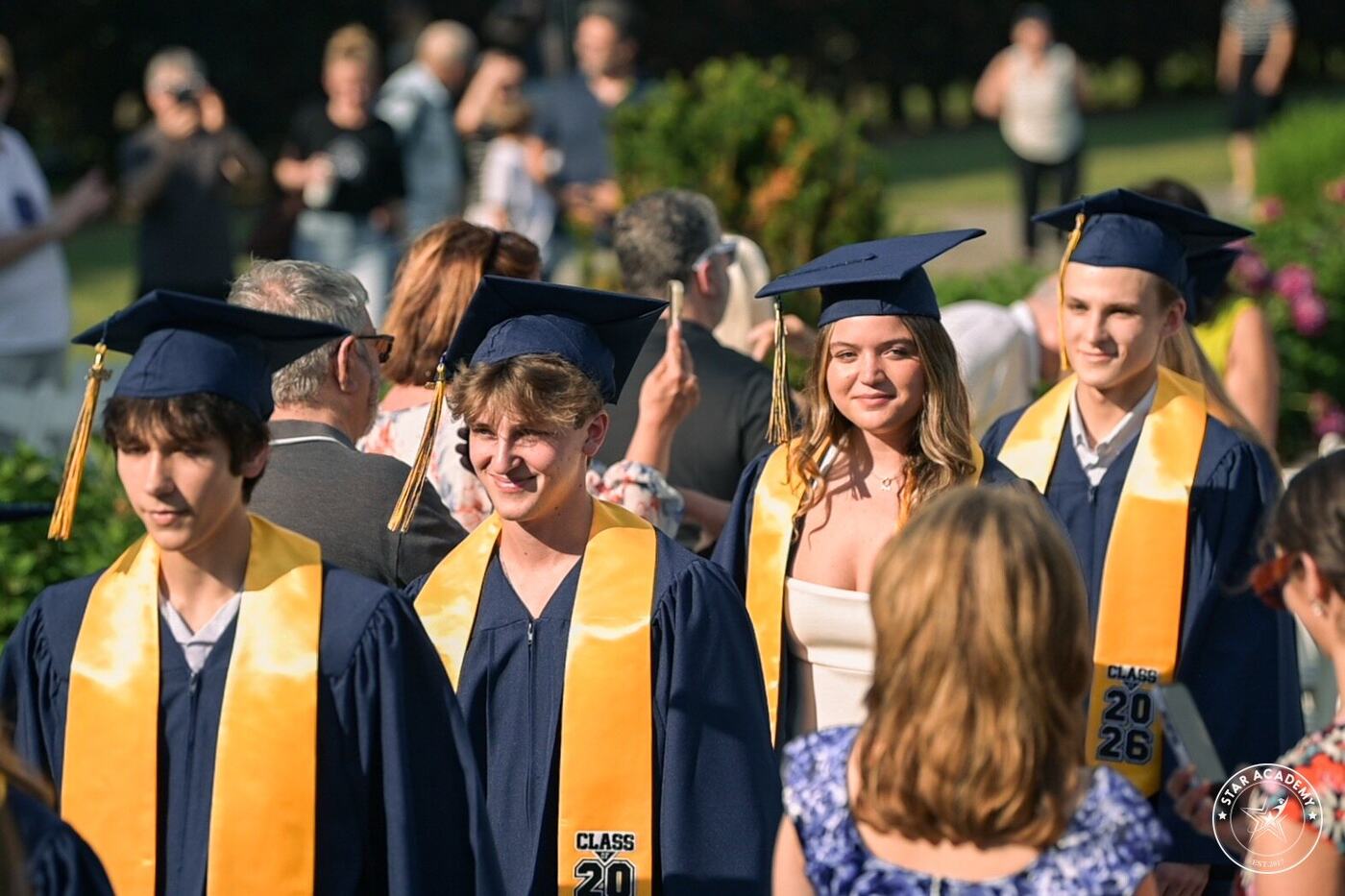 Graduates celebrating after the ceremony